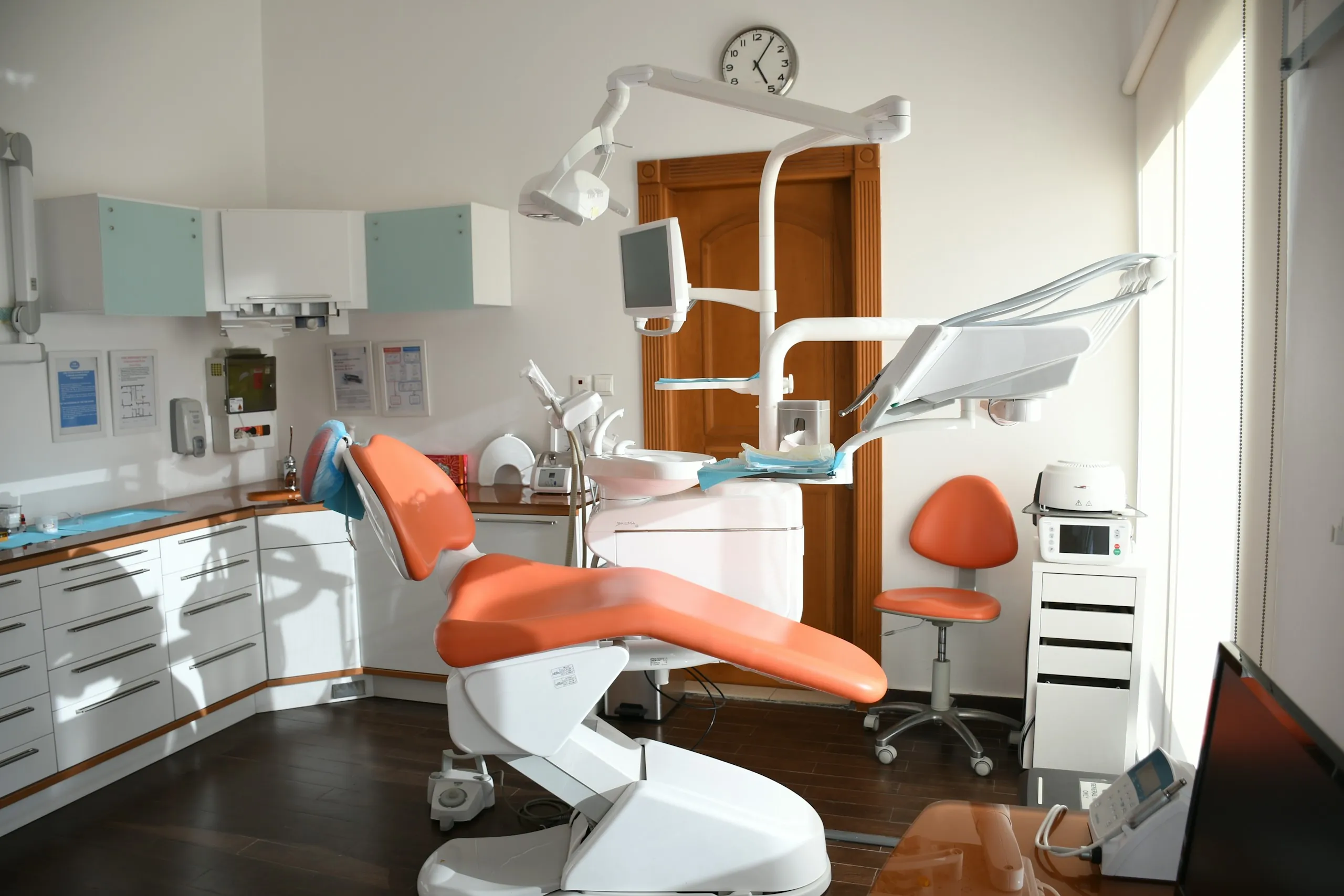 Dental chair in a bright clinic